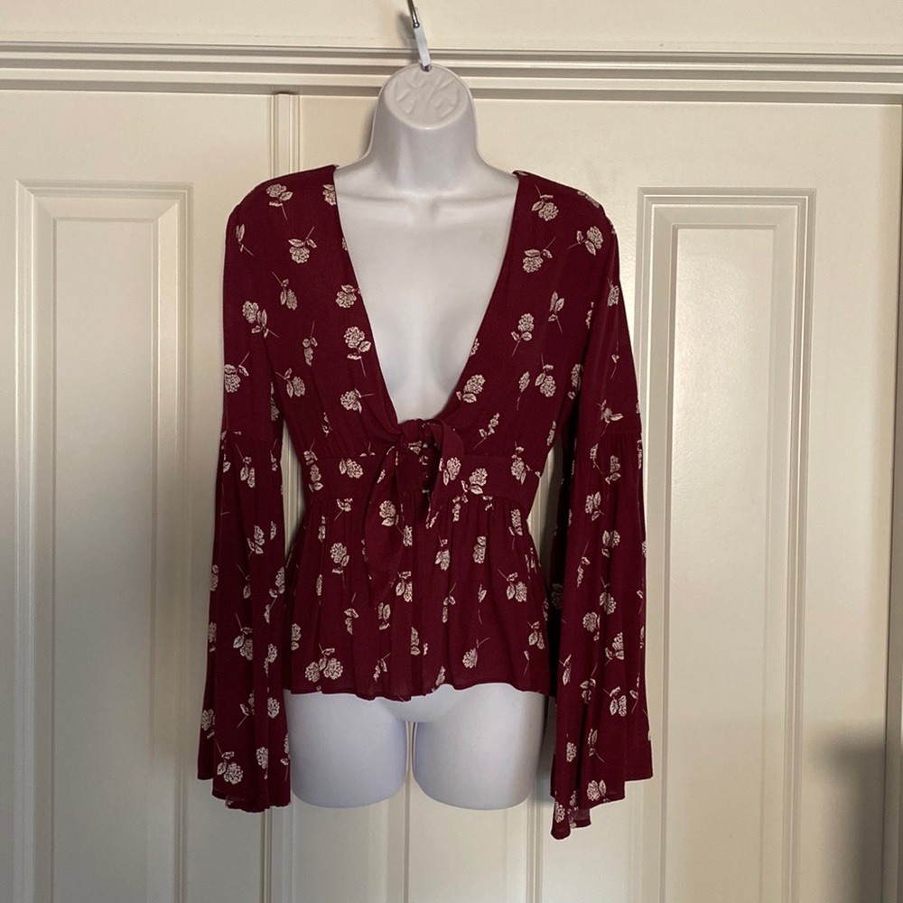 Olivaceous crimson bell sleeve top